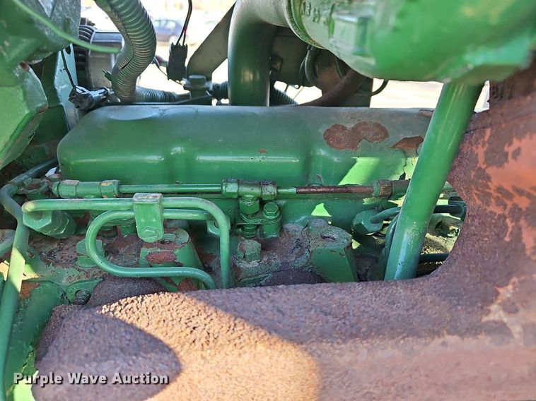 image for item DM1501 1993 John Deere  7600 MFWD tractor