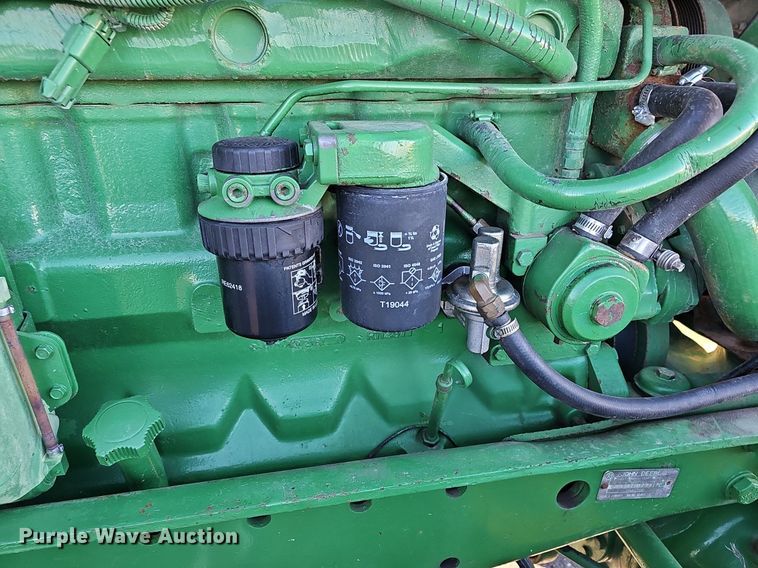 image for item DM1501 1993 John Deere  7600 MFWD tractor