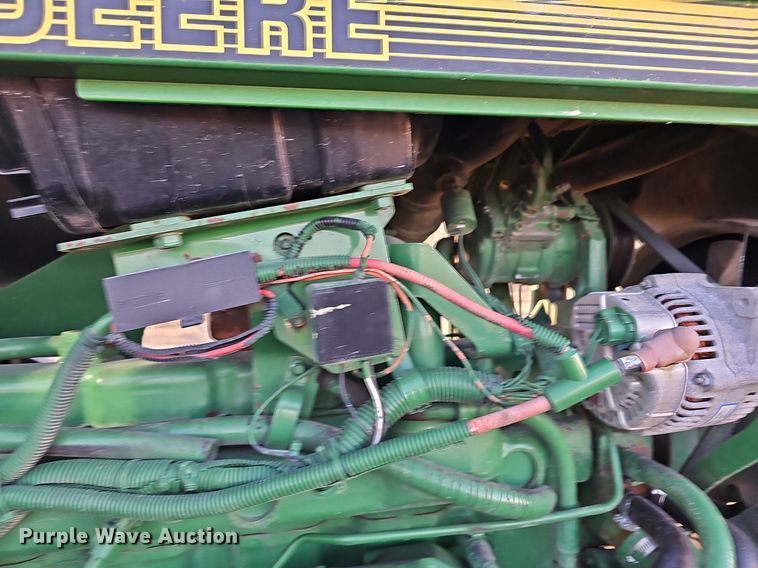 image for item DM1501 1993 John Deere  7600 MFWD tractor