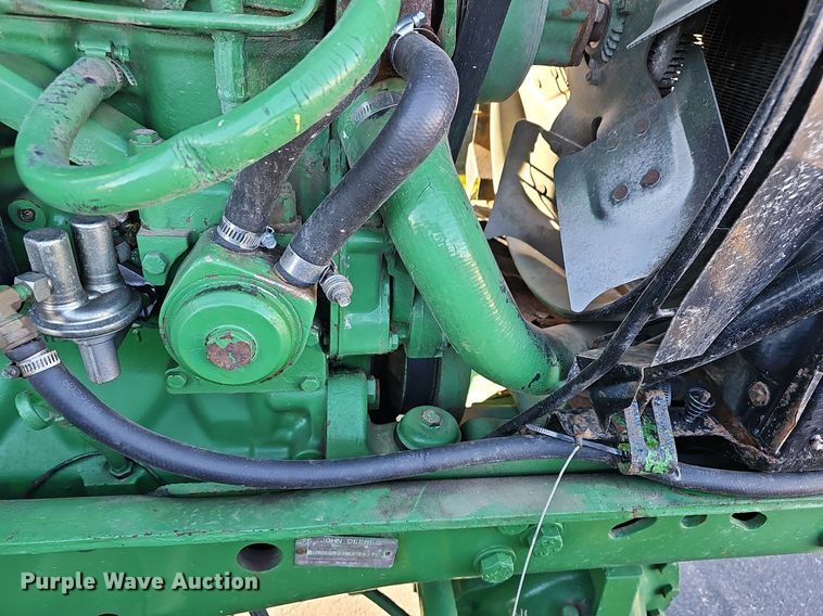 image for item DM1501 1993 John Deere  7600 MFWD tractor