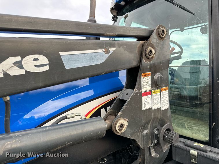 image for item OM9820 2005 New Holland  TS115A MFWD tractor