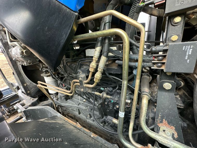 image for item OM9820 2005 New Holland  TS115A MFWD tractor