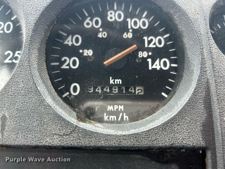 image for item NE9751 1999 Freightliner FL80 flatbed truck