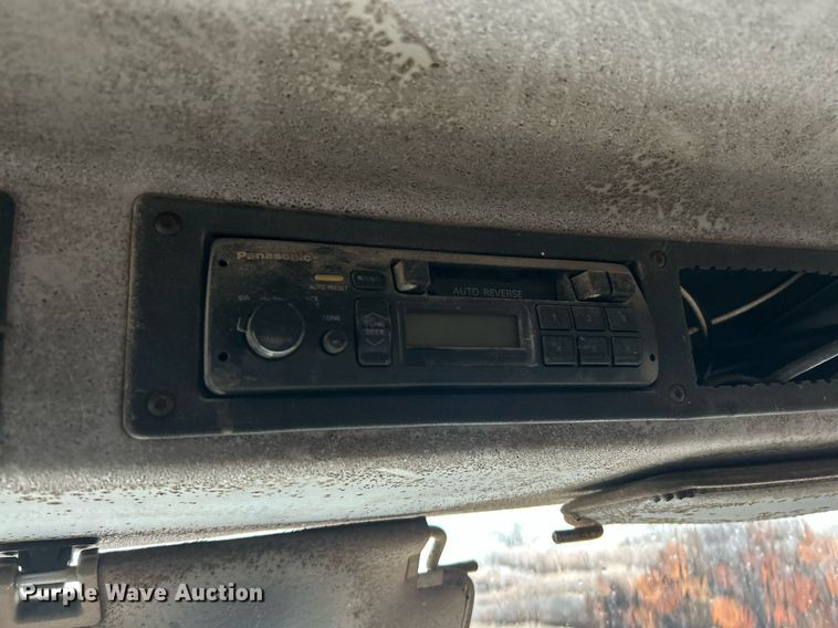 image for item NE9751 1999 Freightliner FL80 flatbed truck