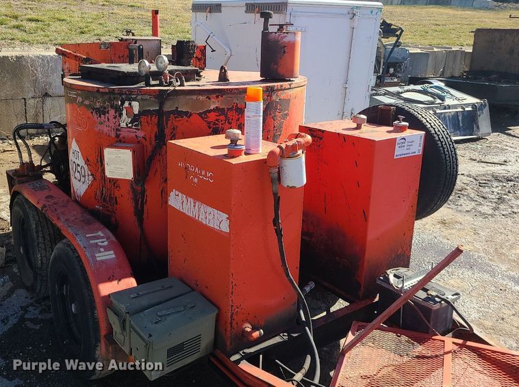 image for item DS7286 Crafco E-Z Pour pothole patcher