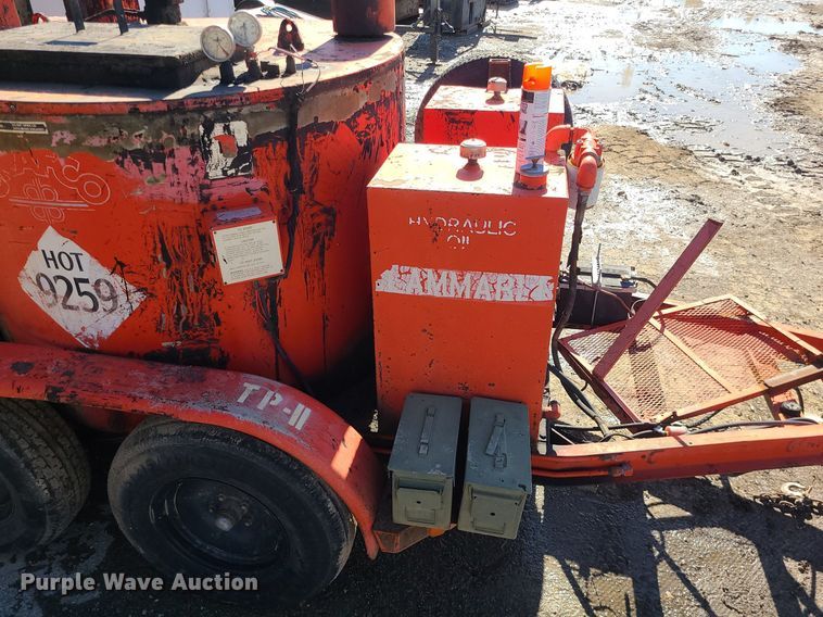 image for item DS7286 Crafco E-Z Pour pothole patcher