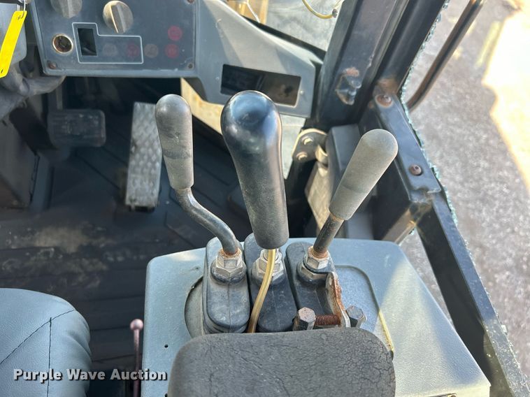 image for item EG1194 1999 Caterpillar  IT28G integrated tool carrier