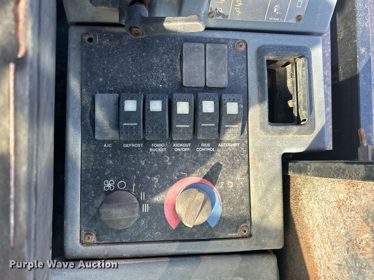 image for item EG1194 1999 Caterpillar  IT28G integrated tool carrier