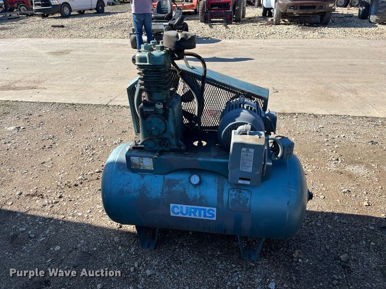 image for item EI0641 Curtis air compressor