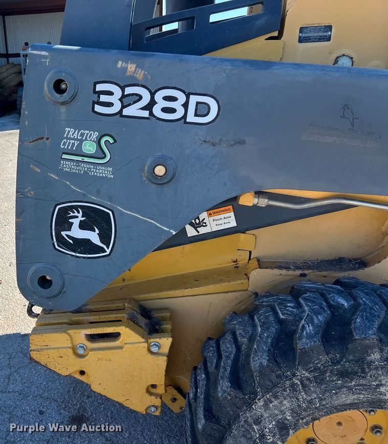 image for item KV9869 2012 John Deere 328D skid steer loader