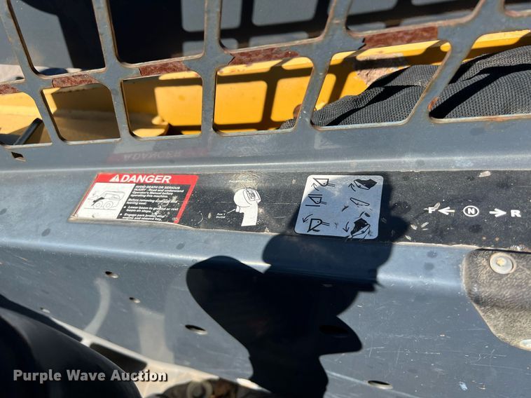 image for item KV9869 2012 John Deere 328D skid steer loader