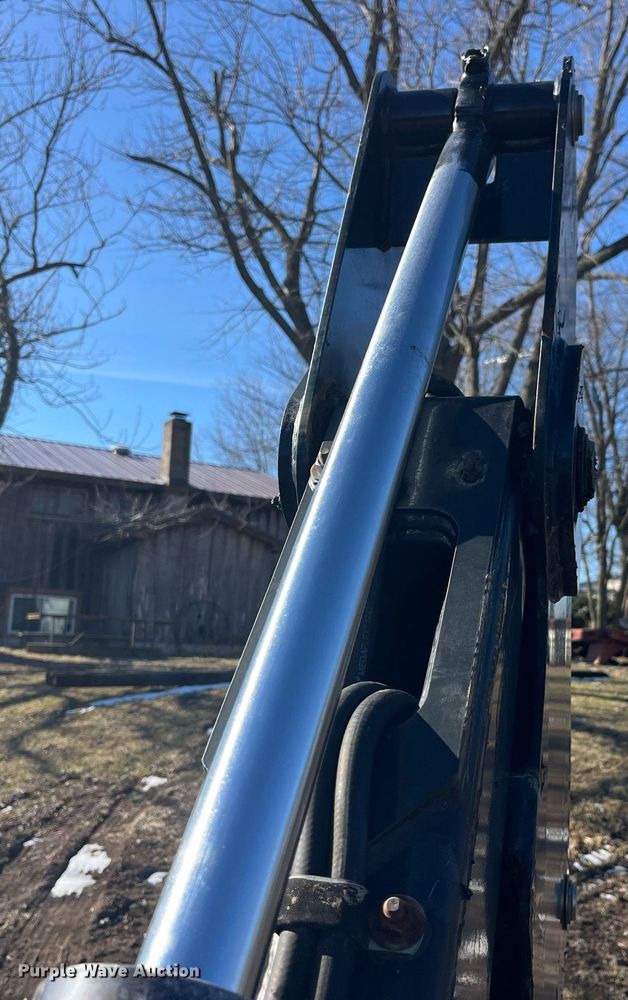 image for item LD9976 Bradco 8611X skid steer backhoe