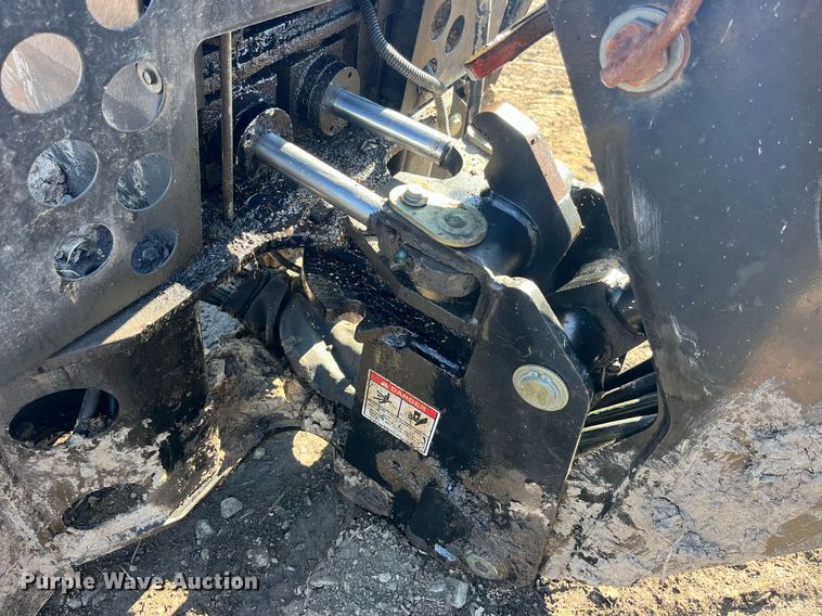 image for item LD9976 Bradco 8611X skid steer backhoe