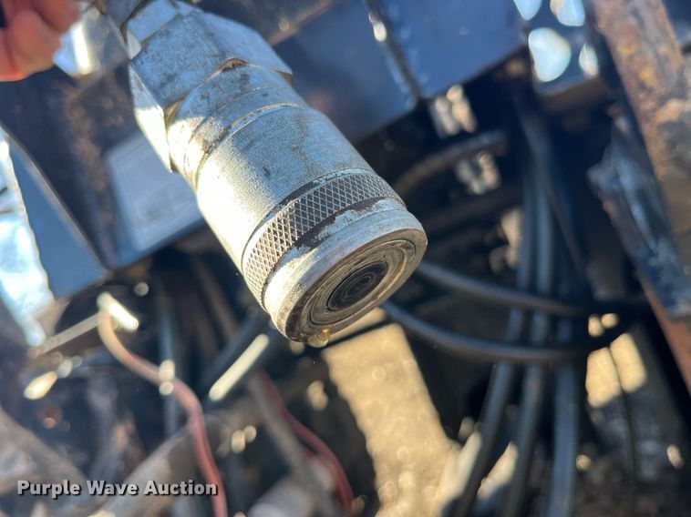 image for item LD9976 Bradco 8611X skid steer backhoe