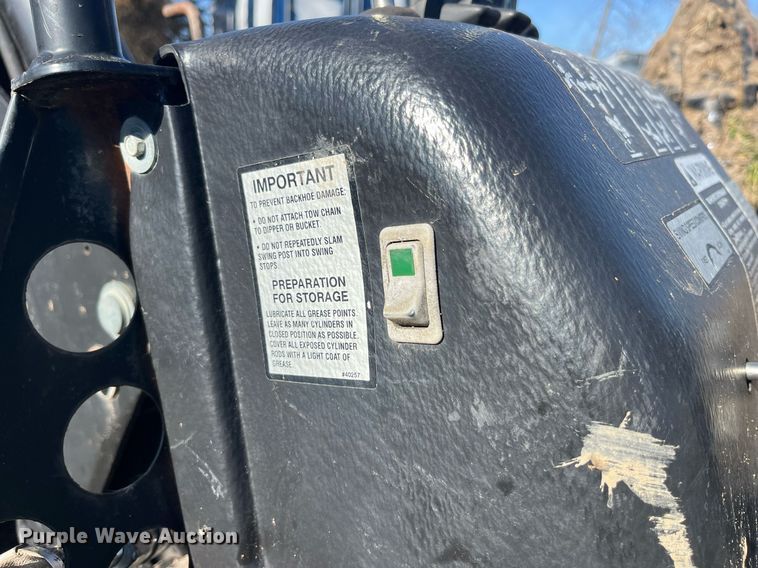 image for item LD9976 Bradco 8611X skid steer backhoe