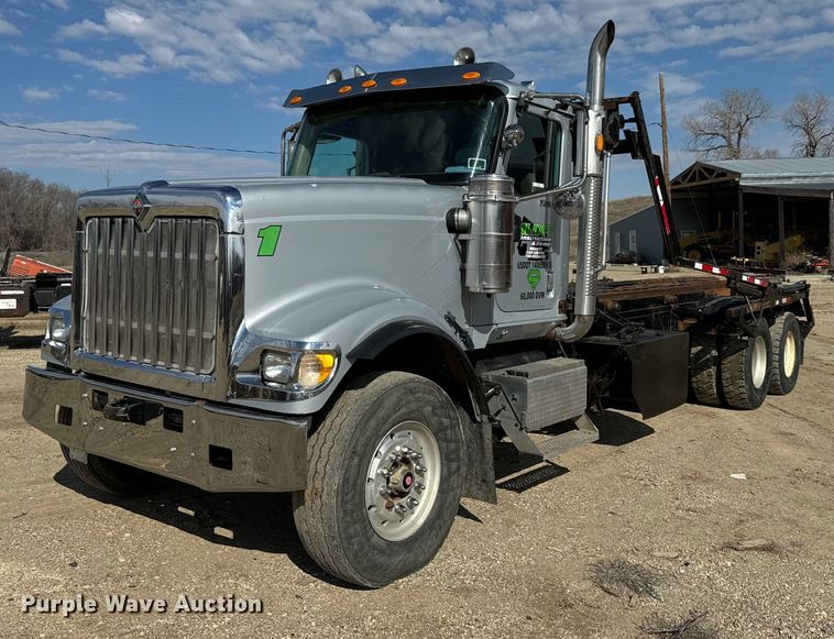 image for item NF9323 2011 International  Paystar roll-off container truck