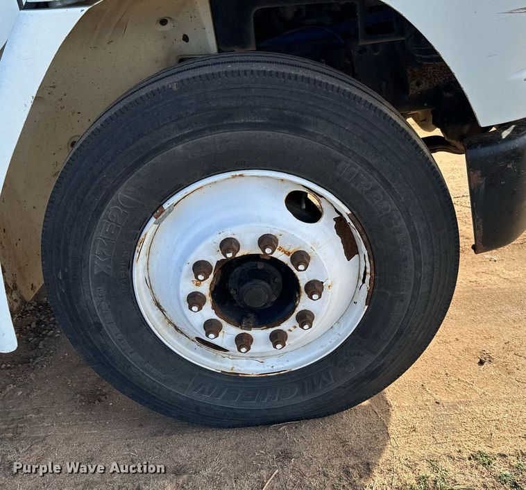 image for item NU9333 2002 Freightliner FL70 vacuum truck