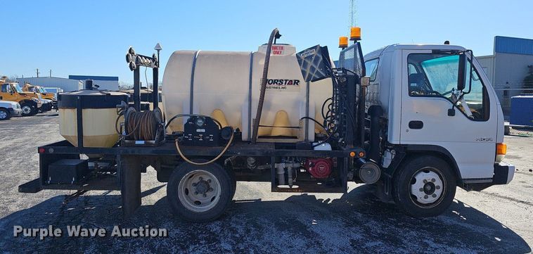 image for item EJ5890 2001 Isuzu NQR flatbed truck