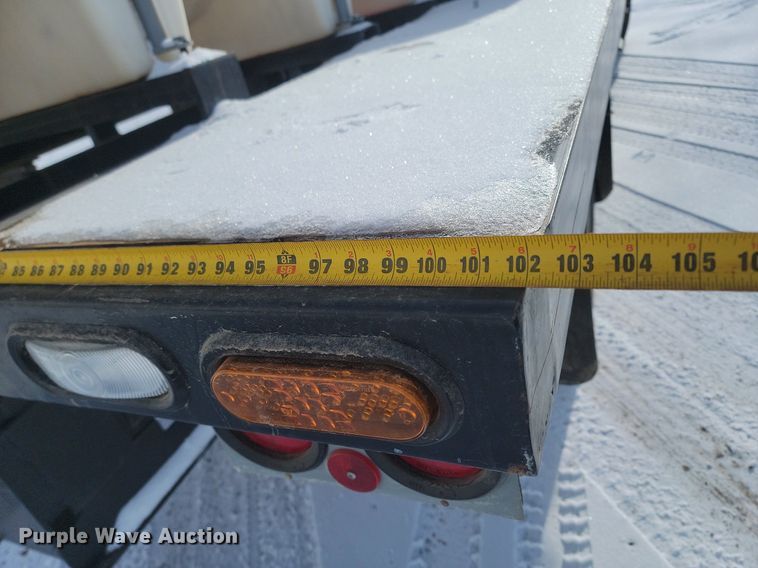 image for item LA9667 1999 International  4700  flatbed truck