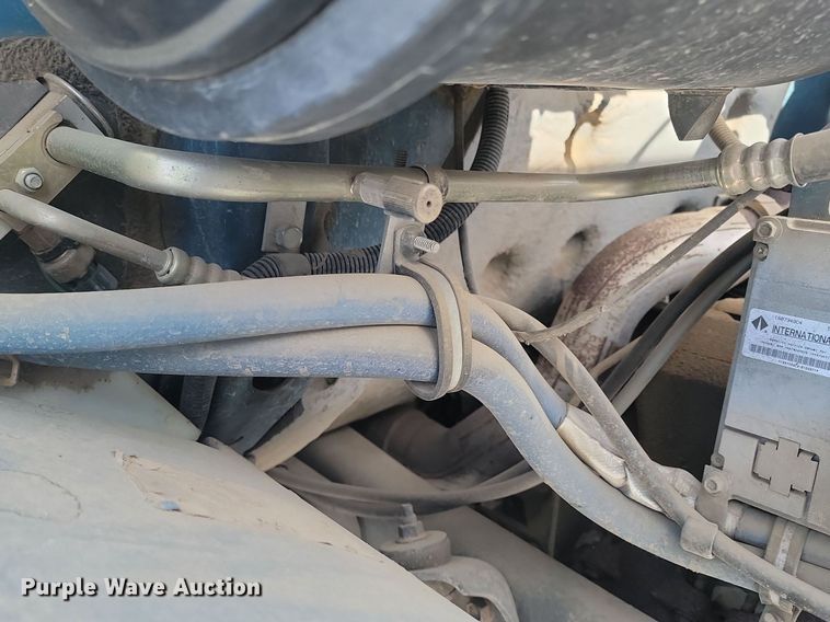 image for item LA9667 1999 International  4700  flatbed truck