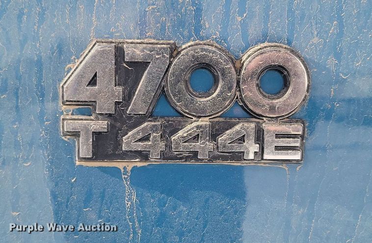 image for item LA9667 1999 International  4700  flatbed truck