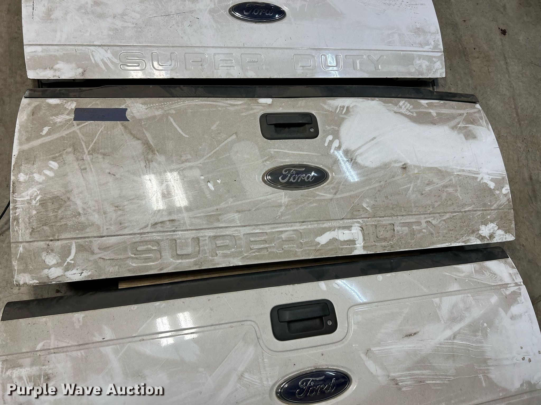 (3) Ford F350 tailgates in Hazelwood, MO Item EK4052 for sale Purple Wave