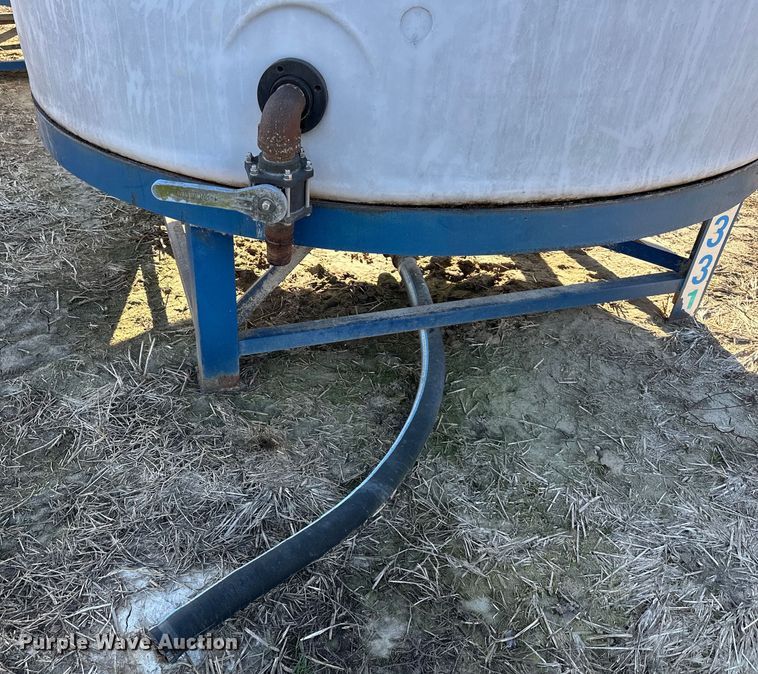 image for item DQ6325 (2) 3,000 gallon poly tanks 