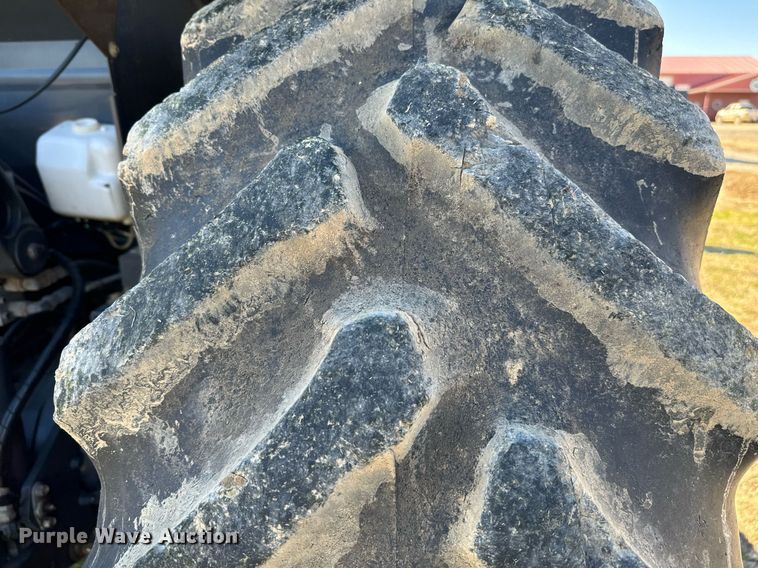 image for item EJ0260 Kubota M126GX MFWD tractor