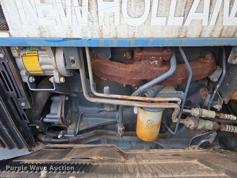 image for item EJ5940 1997 New Hollard 7740 SLE MFWD tractor