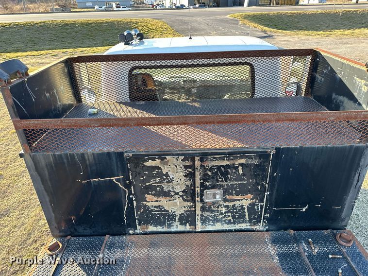 image for item OM9824 1998 International  4700 flatbed truck