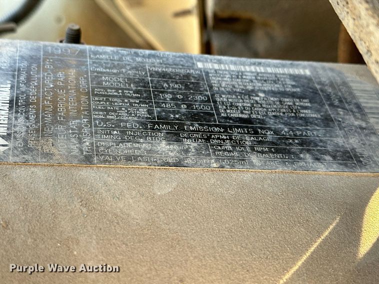 image for item OM9824 1998 International  4700 flatbed truck