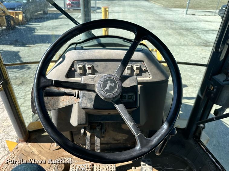 image for item DQ6225 2003 John Deere 310G backhoe