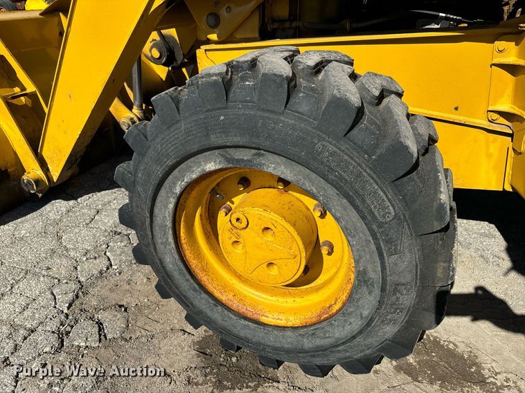 image for item DQ6226 2005 John Deere 310G backhoe