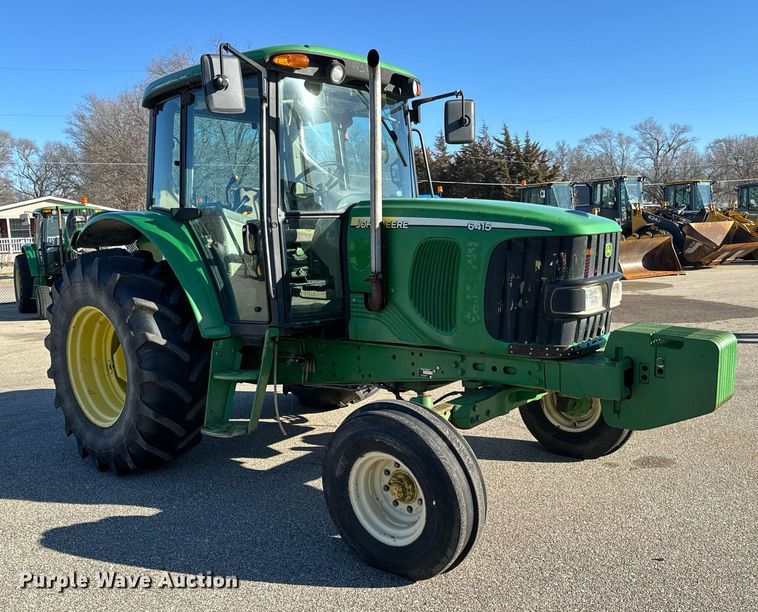 image for item NJ9331 2006 John Deere 6415 tractor