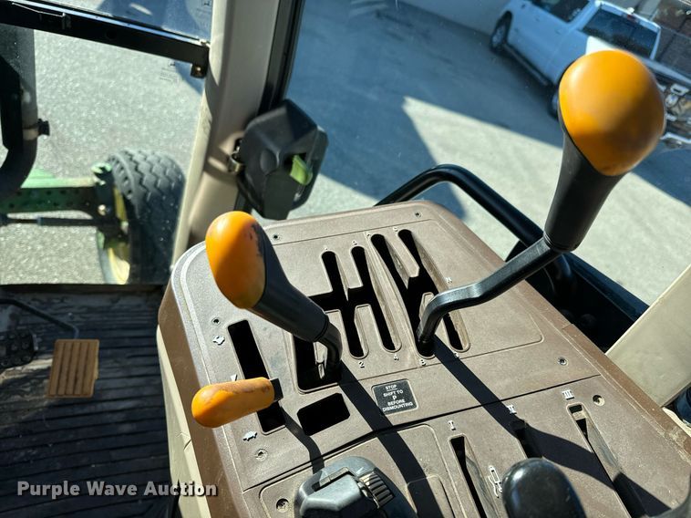 image for item NJ9332 2006 John Deere 6415 tractor