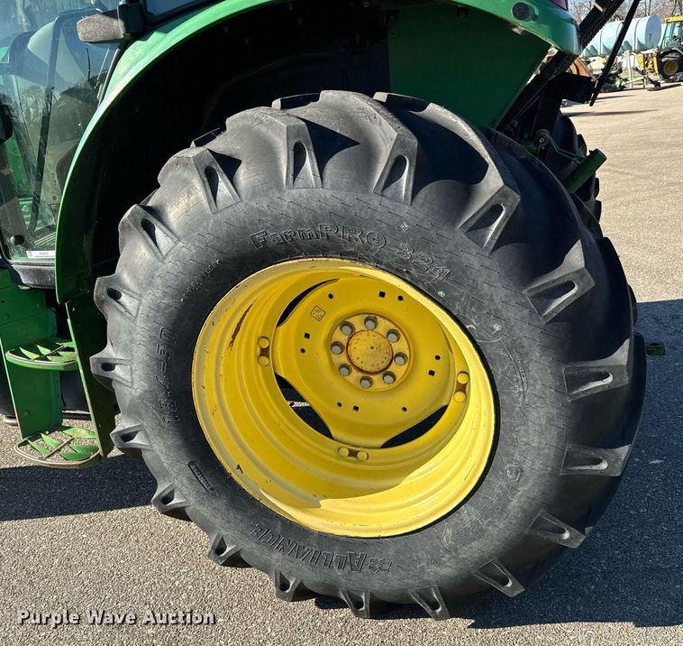 image for item NJ9332 2006 John Deere 6415 tractor