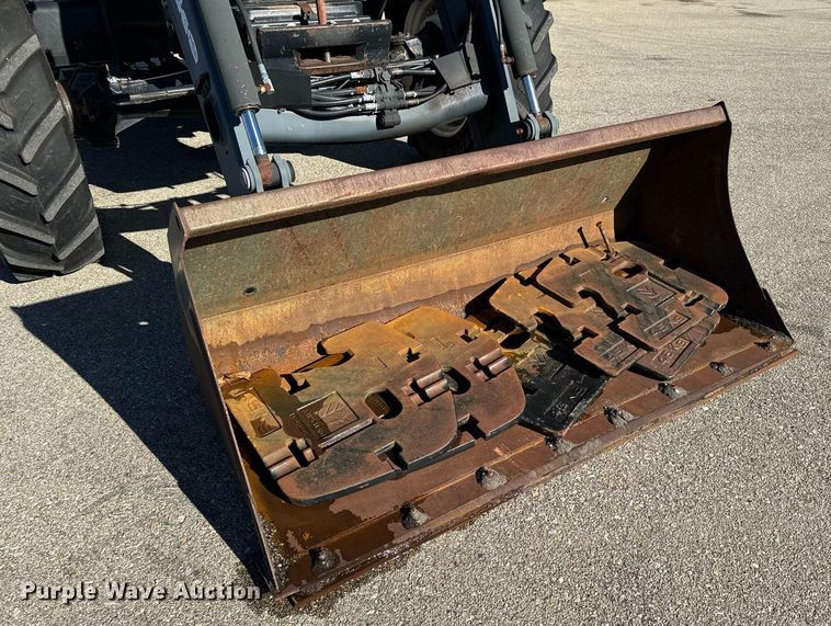 image for item NJ9333 2006 New Holland TM-120 MFWD tractor