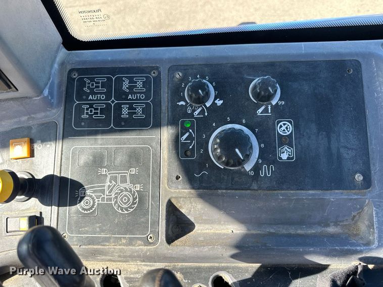 image for item NJ9334 2006 New Holland TM-120 MFWD tractor