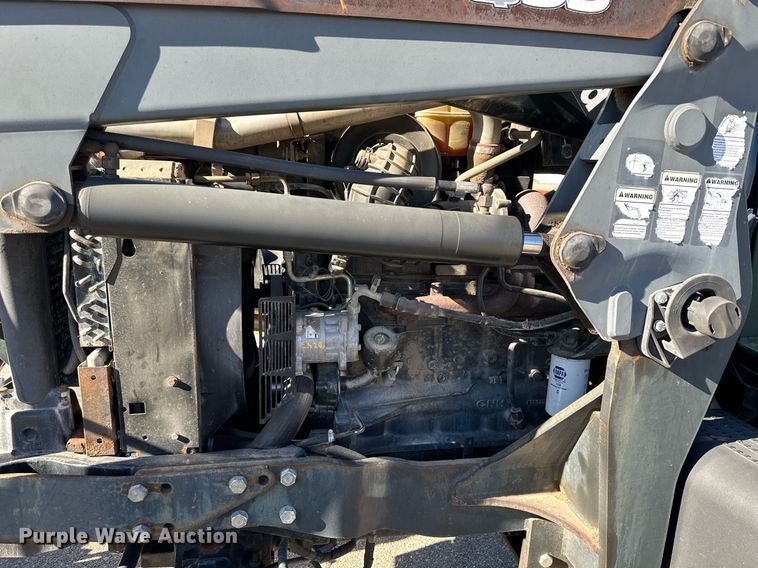 image for item NJ9334 2006 New Holland TM-120 MFWD tractor