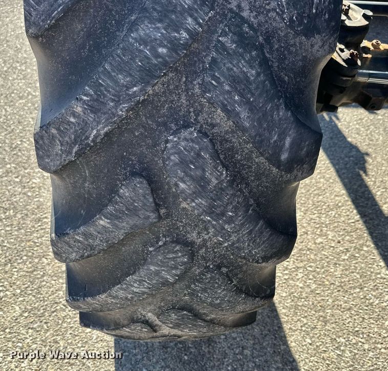 image for item NJ9334 2006 New Holland TM-120 MFWD tractor