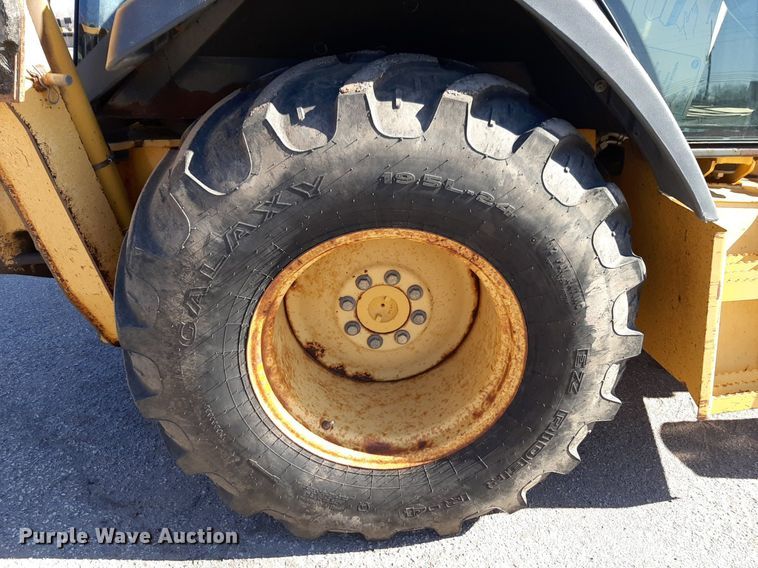 image for item NU9378 1998 John Deere 310G backhoe