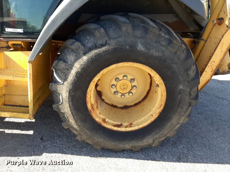 image for item NU9378 1998 John Deere 310G backhoe