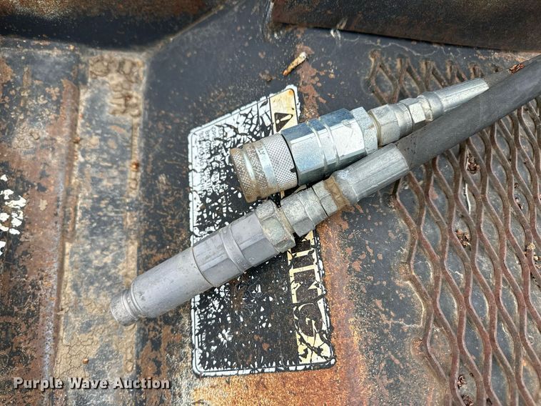 image for item OA9543 Lowe 21 skid steer trencher