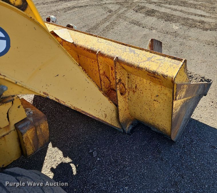 image for item OJ9499 2003 John Deere 310G backhoe