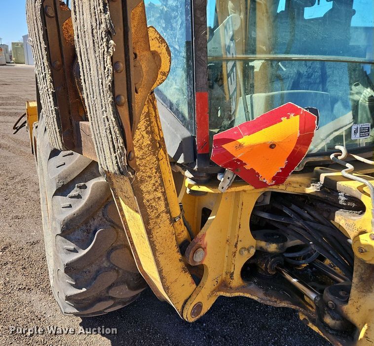 image for item OJ9499 2003 John Deere 310G backhoe