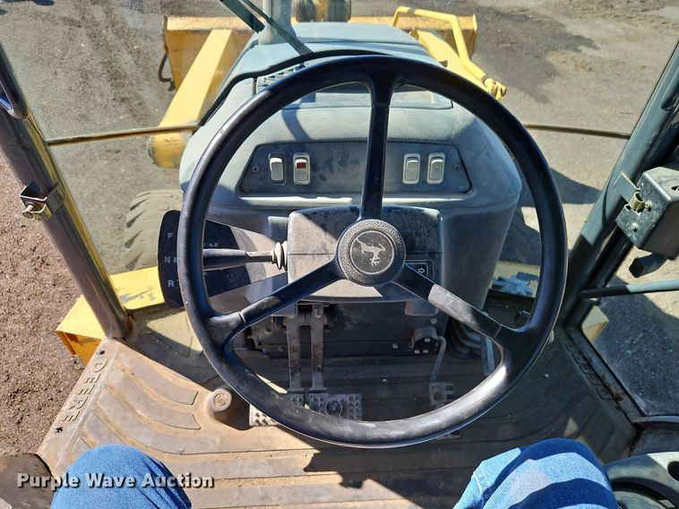 image for item OJ9499 2003 John Deere 310G backhoe