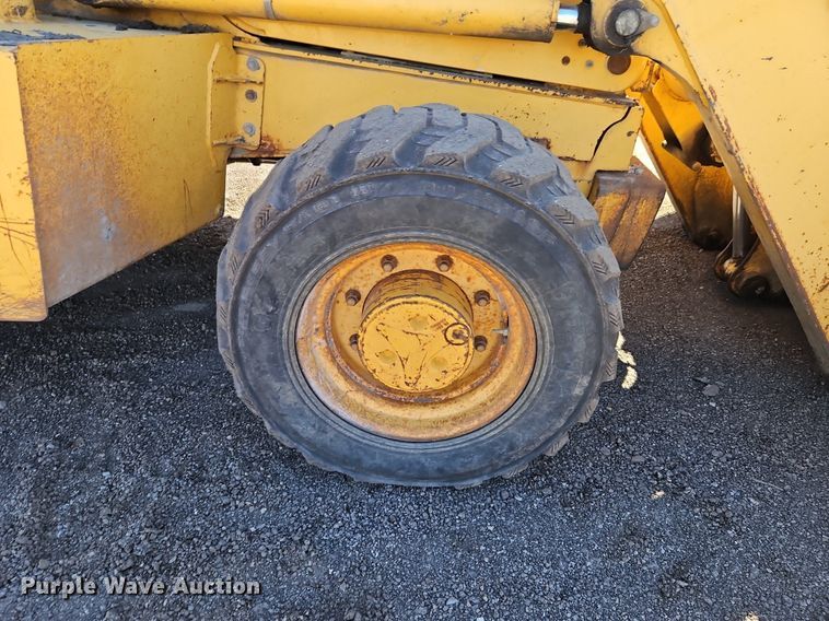 image for item OJ9499 2003 John Deere 310G backhoe