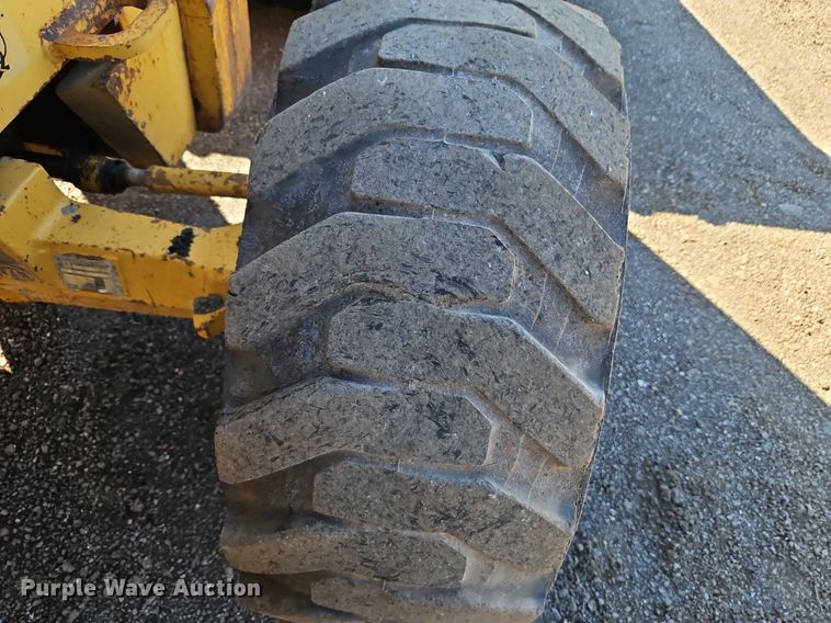 image for item OJ9499 2003 John Deere 310G backhoe