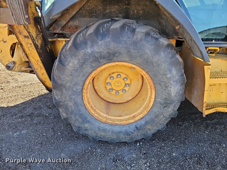 image for item OJ9499 2003 John Deere 310G backhoe