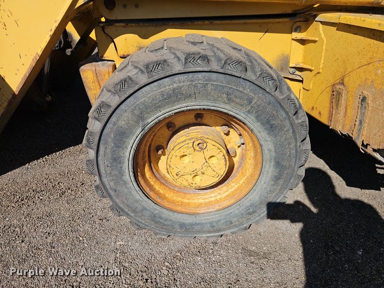 image for item OJ9499 2003 John Deere 310G backhoe